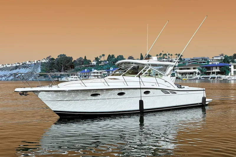 The Image of 2001 Tiara Yachts 3500 Open on calm water with scenic background. - 0