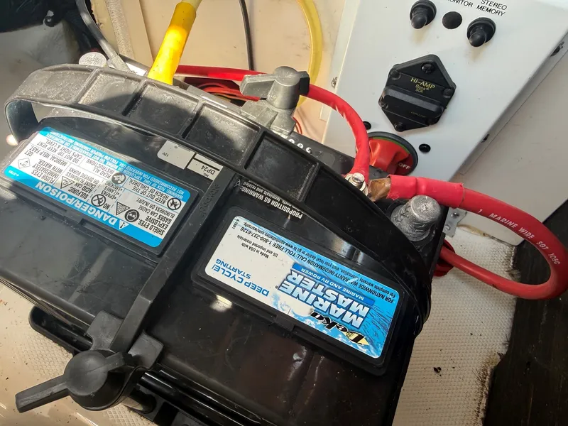 Slide: The Image of A boat battery with red and yellow cables is connected to a control panel. - 20