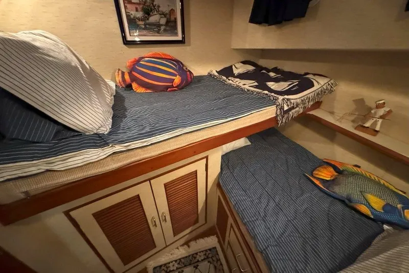Slide: The Image of Cozy cabin interior of 1983 Ocean Alexander 40 Europa with bunk beds and nautical decor. - 19