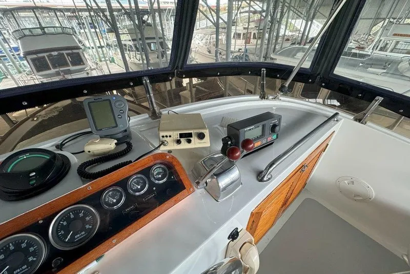 Slide: The Image of Cockpit of 1983 Ocean Alexander 40 Europa yacht with navigation instruments and controls. - 44