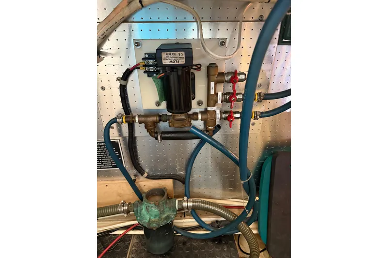 Slide: The Image of Engine room plumbing system of a 2005 North Pacific 42 boat. - 64