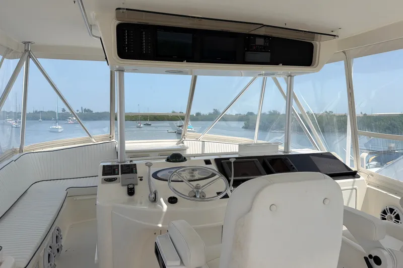 Slide: The Image of Helm of 2002 Ocean Yachts 56 Super Sport with panoramic water views. - 40