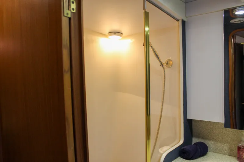 Slide: The Image of Bathroom interior of 2002 Ocean Yachts 56 Super Sport with shower and vanity. - 26
