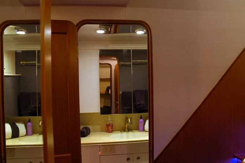 Slide: The Image of Luxurious bathroom interior of 2002 Ocean Yachts 56 Super Sport with elegant fixtures. - 27