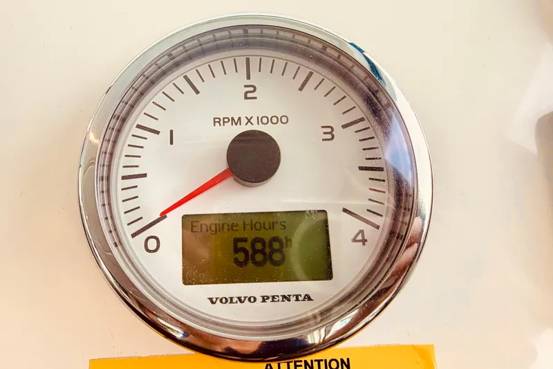 Slide: The Image of Volvo Penta tachometer showing 588 engine hours on a 2019 Beneteau Swift Trawler 30. - 22