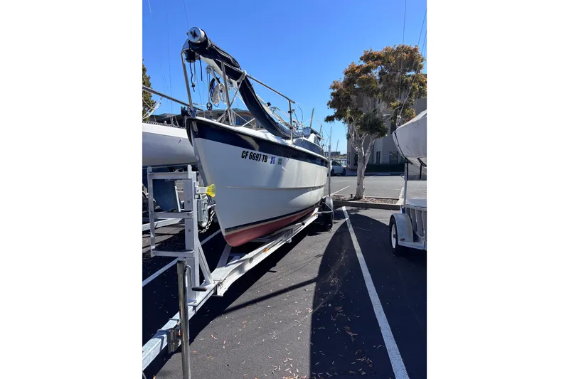 Slide: The Image of Sailboat Tattoo 26, 2014 model, on trailer in sunny parking lot. - 17