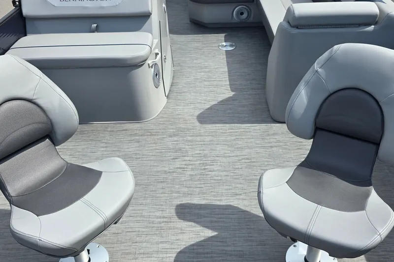 Slide: The Image of 2022 Bennington SX 22 Fishing boat interior with two gray swivel seats. - 14