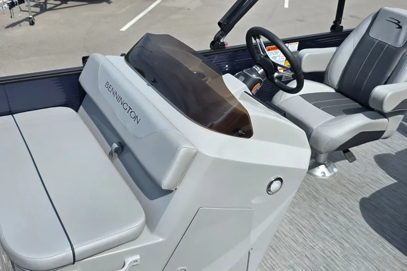 Slide: The Image of 2022 Bennington SX 22 Fishing boat interior with steering console and seating. - 7
