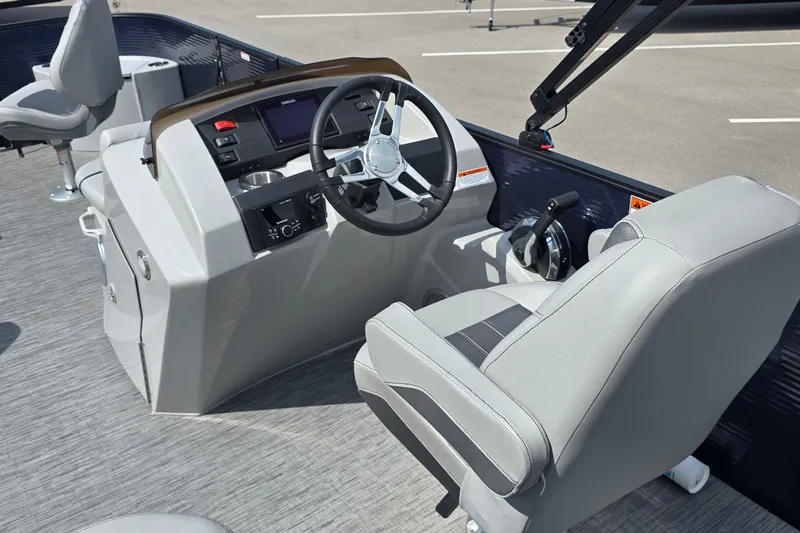 Slide: The Image of 2022 Bennington SX 22 Fishing boat interior with steering console and seating. - 12