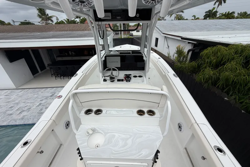 Slide: The Image of 2026 Sea Hunt Ultra 265SE boat interior with modern helm and seating. - 3