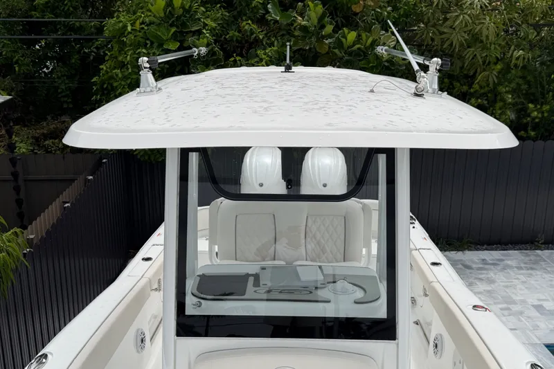 Slide: The Image of 2026 Sea Hunt Ultra 265SE boat with sleek design and modern features. - 6