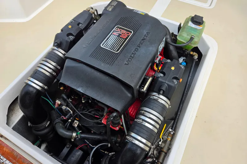 Slide: The Image of Volvo Penta engine in a 2004 Hunt Yachts Surfhunter 25 boat, showcasing detailed components. - 8
