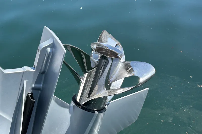 Slide: The Image of Close-up of a 2024 Axopar 37 XC Cross Cabin boat propeller in water. - 8