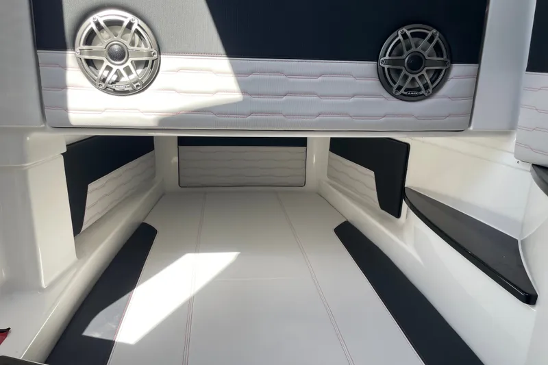 Slide: The Image of Interior of 2023 Cigarette 41' Nighthawk boat with sleek seating and speakers. - 15