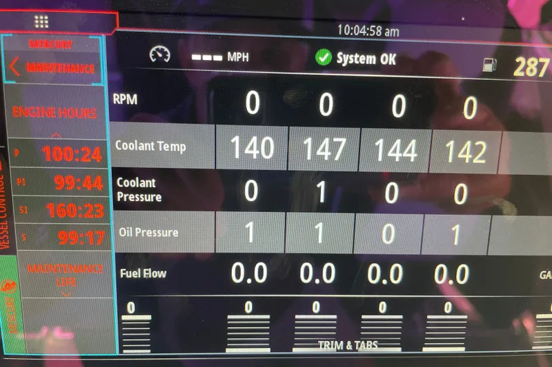 Slide: The Image of Dashboard display of 2023 Cigarette 41' Nighthawk showing engine metrics and system status. - 14