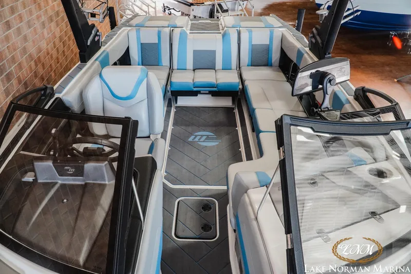 Slide: The Image of 2024 Malibu Wakesetter 23 LSV interior with modern seating and sleek design. - 14