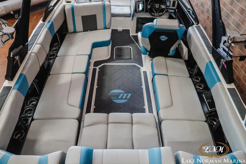 Slide: The Image of 2024 Malibu Wakesetter 23 LSV interior with spacious seating and modern design. - 8
