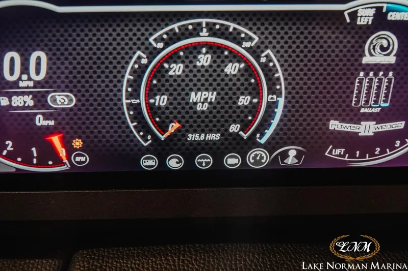 Slide: The Image of Dashboard of 2024 Malibu Wakesetter 23 LSV showing speedometer and controls. - 16