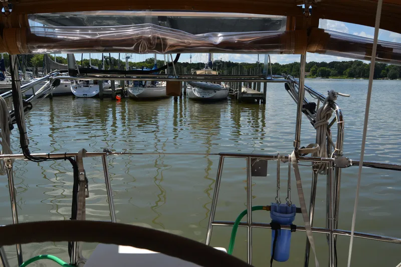 Slide: The Image of View from Sabre 402 sailboat cockpit, docked at marina, 2002 model. - 55