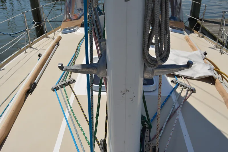 Slide: The Image of Deck view of a 2002 Sabre 402 sailboat with ropes and fittings. - 42