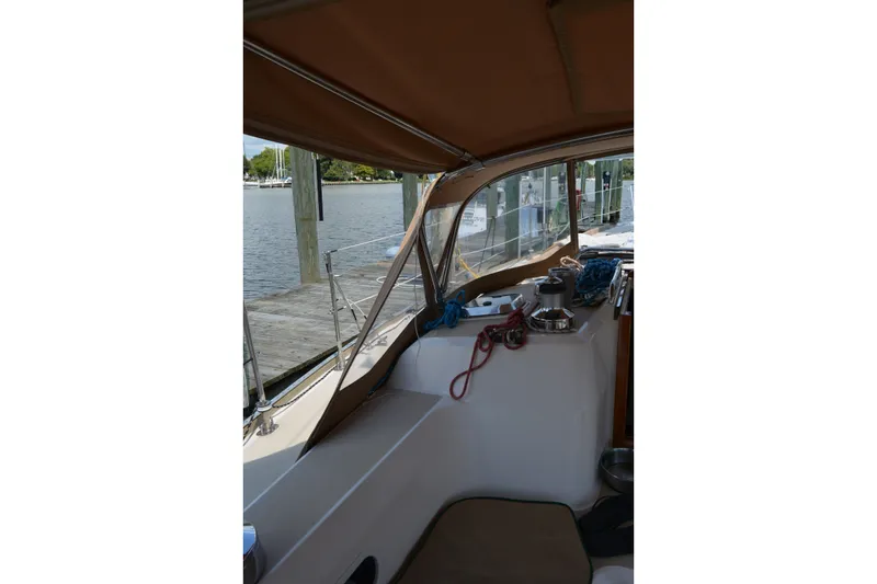 Slide: The Image of Interior view of a 2002 Sabre 402 sailboat docked at a marina. - 64