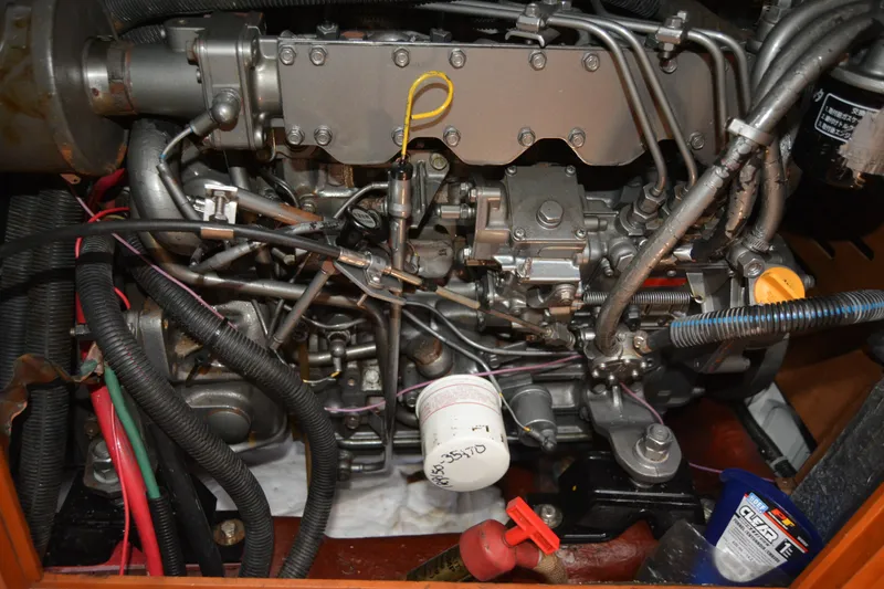 Slide: The Image of Engine compartment of a 2002 Sabre 402, showcasing intricate wiring and components. - 138
