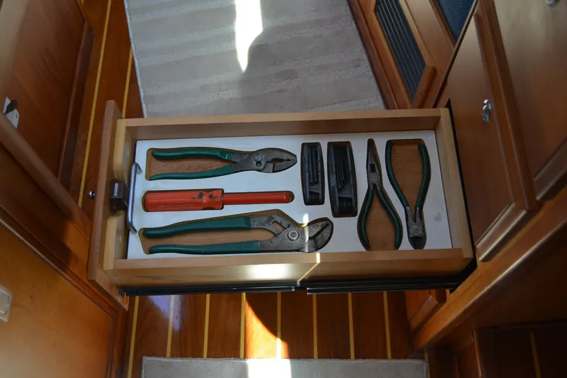 Slide: The Image of Drawer with assorted tools on a 2002 Sabre 402 yacht. - 114