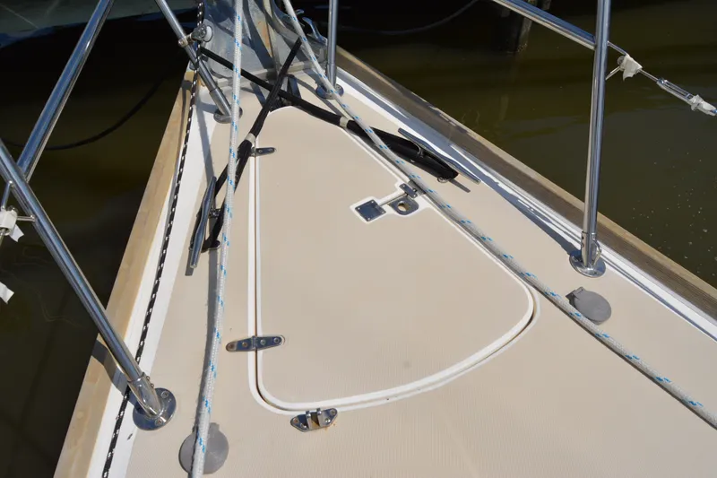 Slide: The Image of Deck of 2002 Sabre 402 sailboat with rigging and hardware details. - 31
