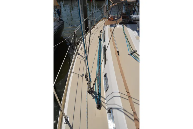 Slide: The Image of Deck view of a 2002 Sabre 402 sailboat with rigging and lines. - 39