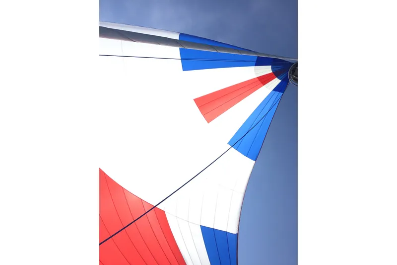 Slide: The Image of Colorful sail of Sabre 402 yacht against clear blue sky, 2002 model. - 21