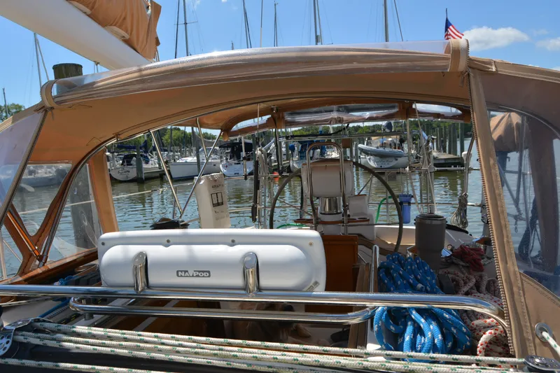 Slide: The Image of Cockpit view of a 2002 Sabre 402 sailboat docked at a marina. - 46