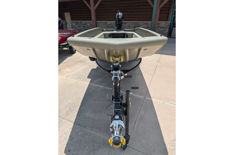 The Image of 2026 Tracker Grizzly 1650 T Prairie Wings Edition boat on trailer, front view. - 0
