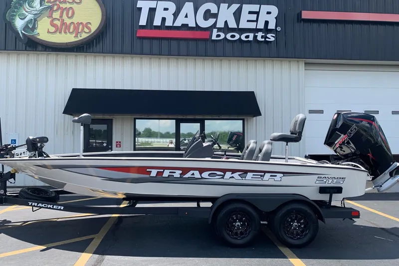 The Image of 2026 Tracker Savage 215 boat displayed at Bass Pro Shops dealership. - 0