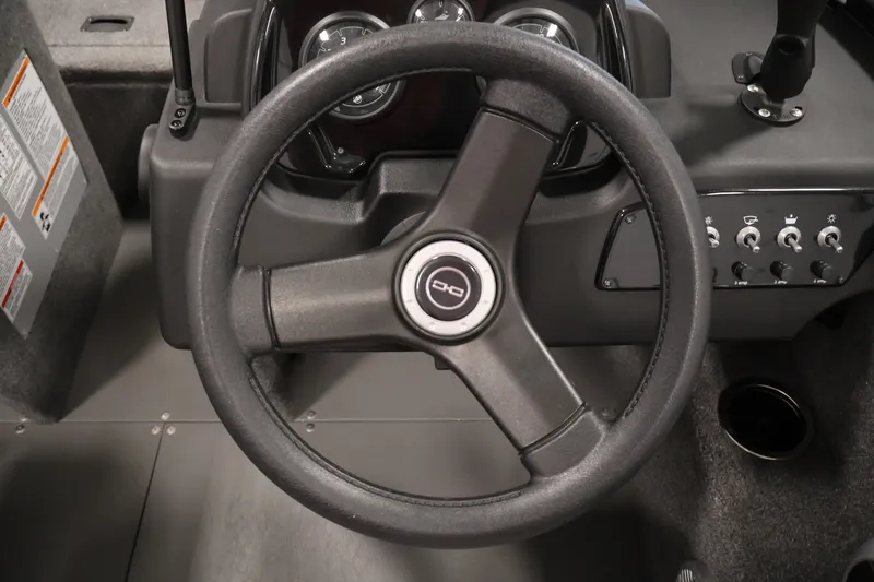 Slide: The Image of Steering wheel and dashboard of 2025 Princecraft Holiday 162 WS MAX boat. - 21