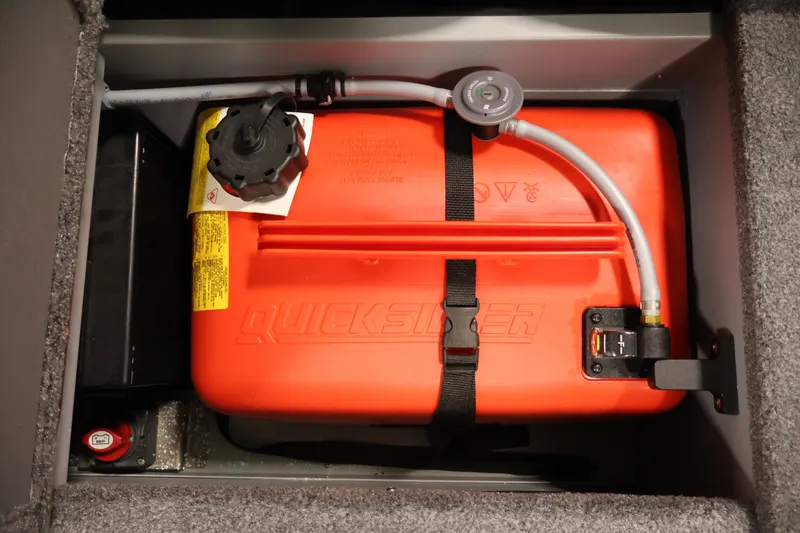 Slide: The Image of Fuel tank compartment of 2025 Princecraft Holiday 162 WS MAX boat, featuring Quicksilver tank. - 30
