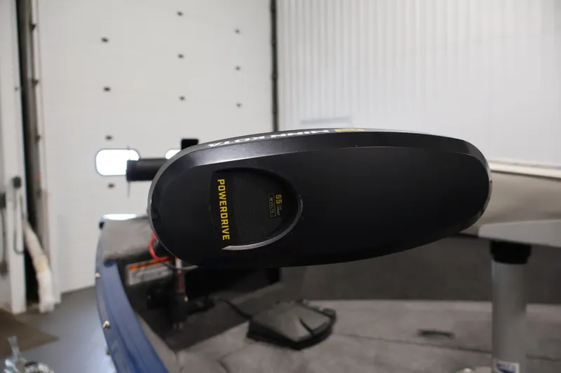 Slide: The Image of 2025 Princecraft Holiday 162 WS MAX boat with PowerDrive motor in a garage setting. - 12