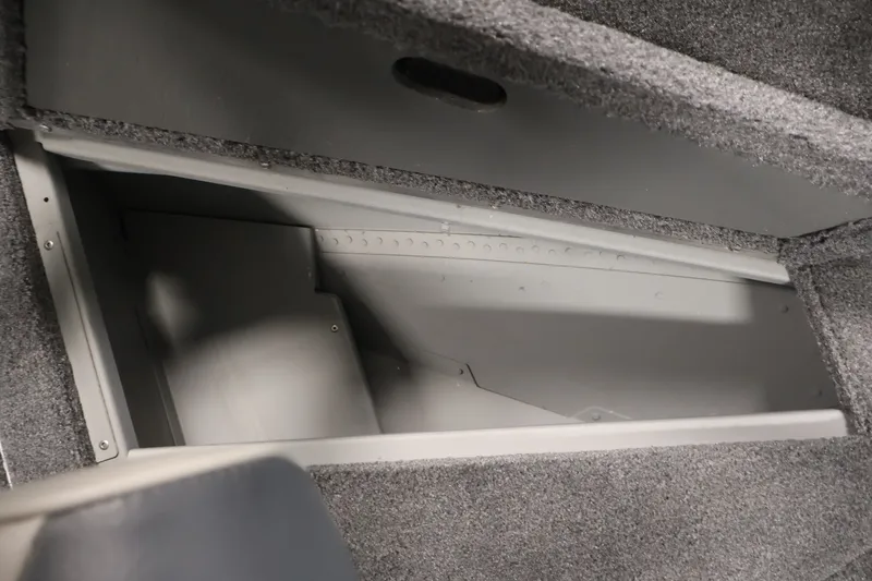 Slide: The Image of Storage compartment in 2025 Princecraft Holiday 162 WS MAX boat, featuring gray interior. - 16