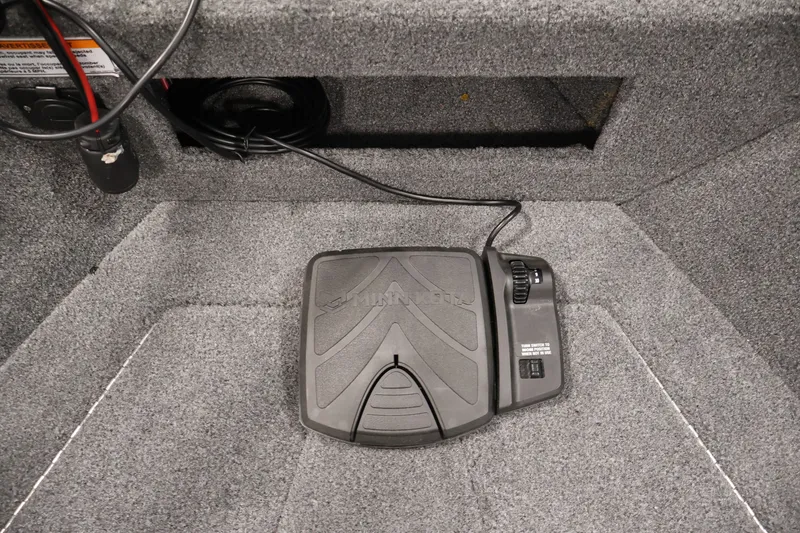 Slide: The Image of Foot pedal control in 2025 Princecraft Holiday 162 WS MAX boat, carpeted interior. - 14