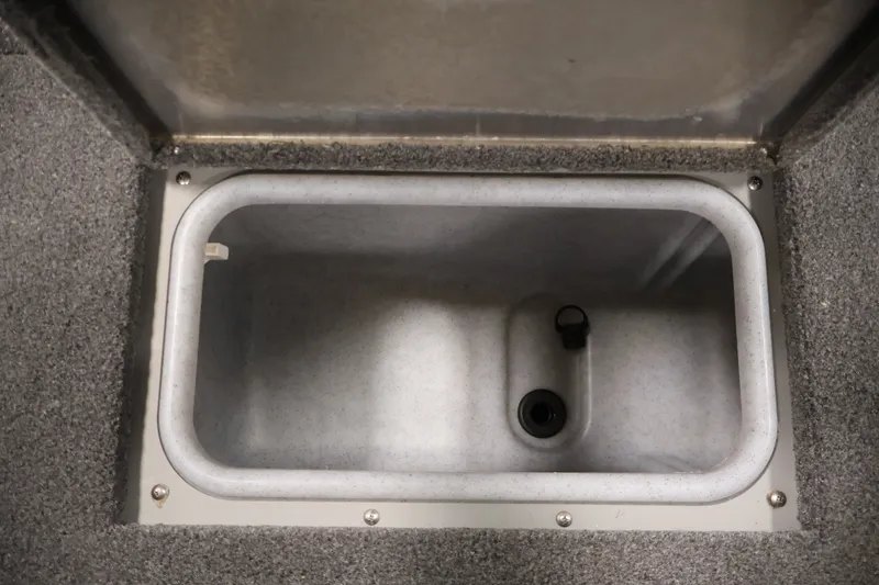Slide: The Image of 2025 Princecraft Holiday 162 WS MAX boat storage compartment, open and empty. - 18
