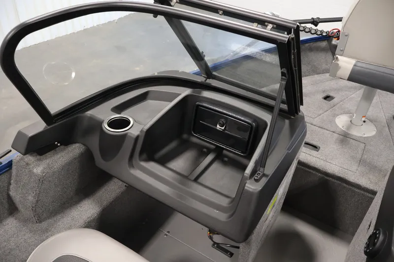 Slide: The Image of 2025 Princecraft Holiday 162 WS MAX boat interior with windshield and seating area. - 27