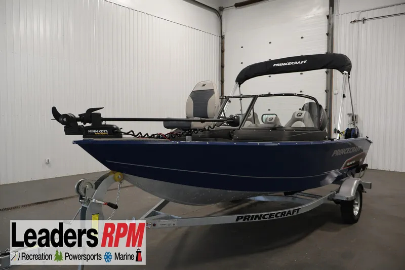 The Image of 2025 Princecraft Holiday 162 WS MAX boat in showroom, featuring Minn Kota trolling motor. - 1