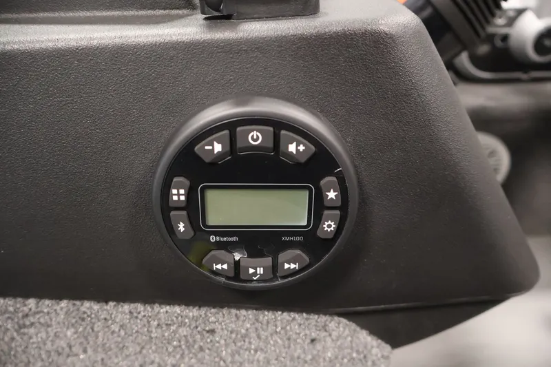 Slide: The Image of Control panel of 2025 Princecraft Holiday 162 WS MAX boat with Bluetooth functionality. - 25