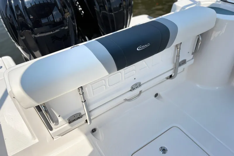 Slide: The Image of 2023 Robalo R272 Center Console boat seat and engine detail. - 38