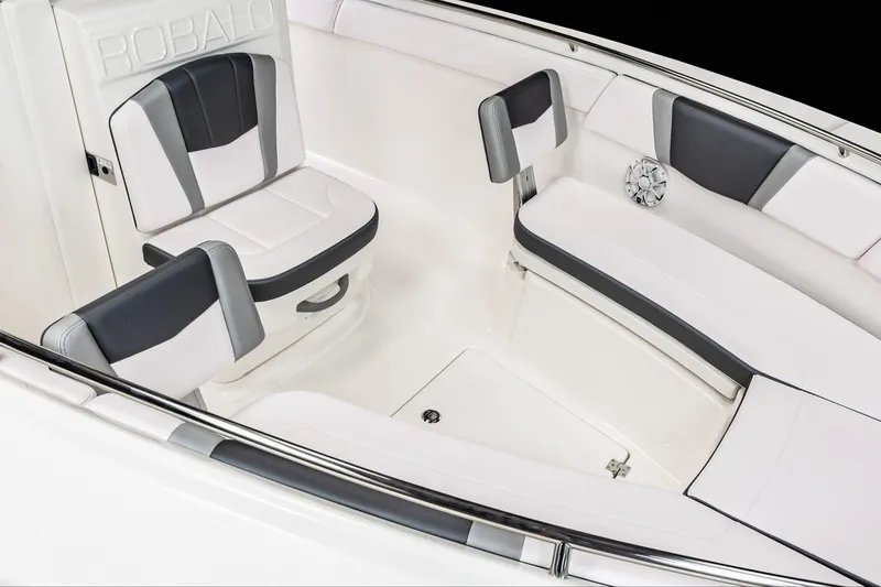 Slide: The Image of Manufacturer Provided Image: 2023 Robalo R272 Center Console boat seating area with white and black upholstery. - 54
