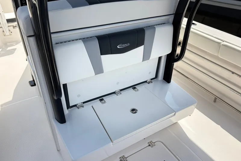 Slide: The Image of 2023 Robalo R272 Center Console boat seat with storage compartment. - 16