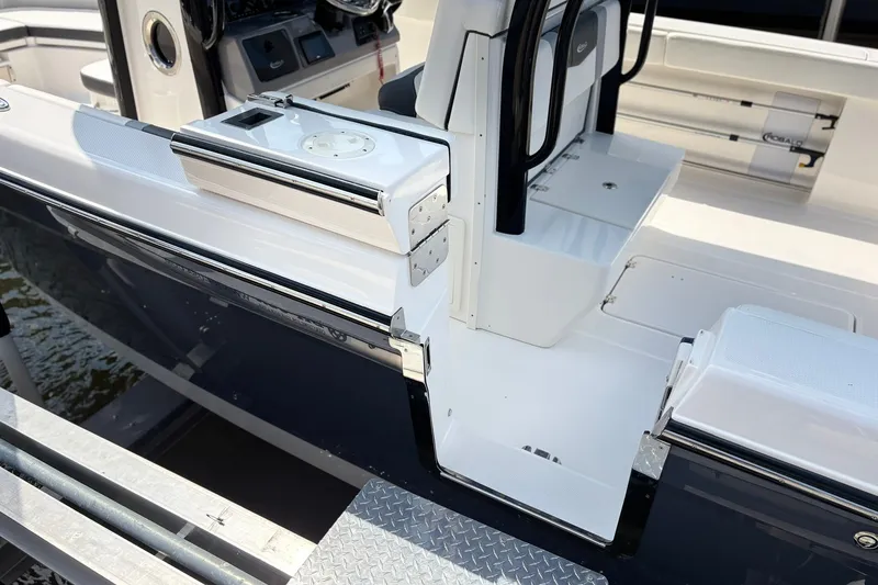 Slide: The Image of 2023 Robalo R272 Center Console boat interior with sleek design and modern features. - 14