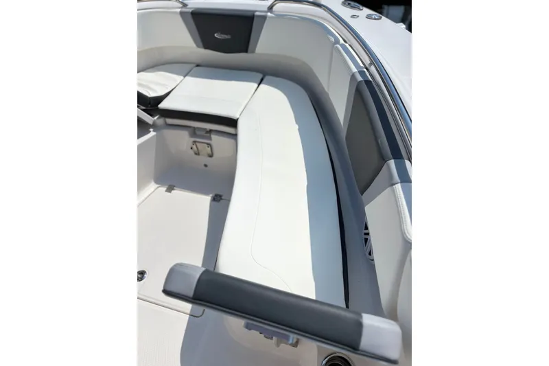 Slide: The Image of 2023 Robalo R272 Center Console boat interior with cushioned seating and sleek design. - 50