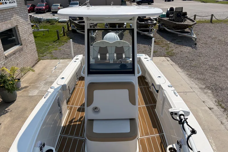 Slide: The Image of 2022 Edgewater 230CC boat with sleek design, spacious deck, and modern features. - 12