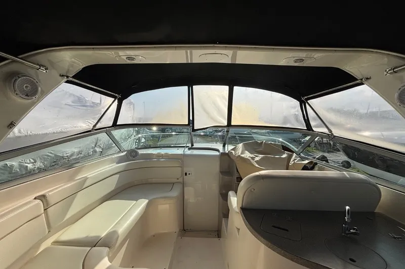 Slide: The Image of Interior of 2003 Rinker Fiesta Vee 312 boat with seating and helm. - 8