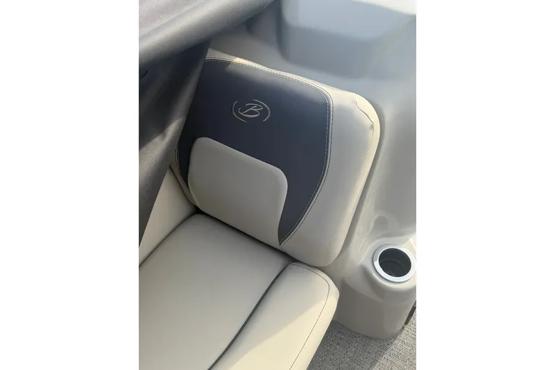 Slide: The Image of 2024 Barletta A22UC boat seat with logo and cup holder. - 19